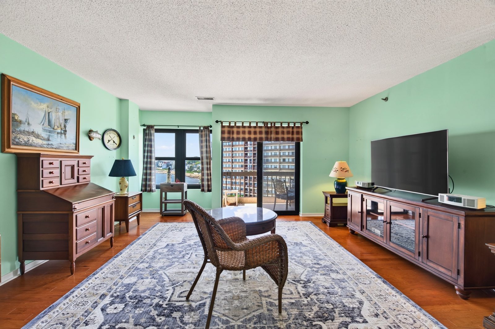 Condo living room with harbor views, Winthrop MA